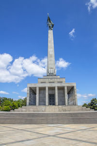 Low angle view of statue against sky