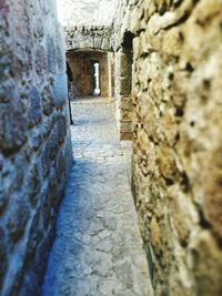 Low angle view of stone wall