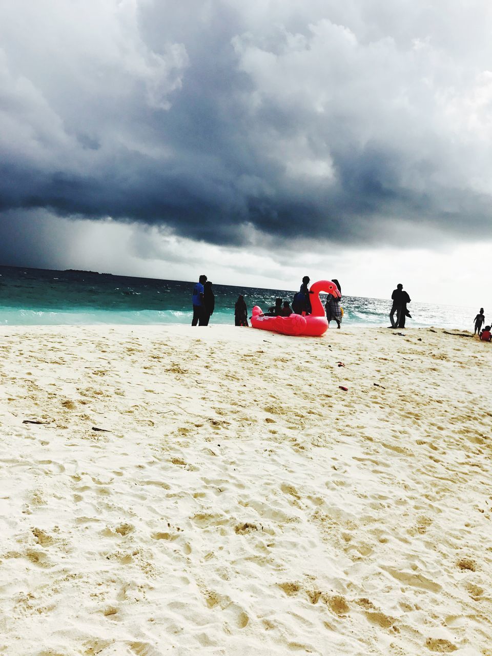 beach, cloud - sky, sand, sky, sea, nature, real people, water, horizon over water, day, scenics, leisure activity, togetherness, lifestyles, beauty in nature, outdoors, men, vacations, people