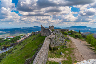 Panoramic view of old ruins against sky