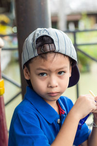 Portrait of boy wearing cap