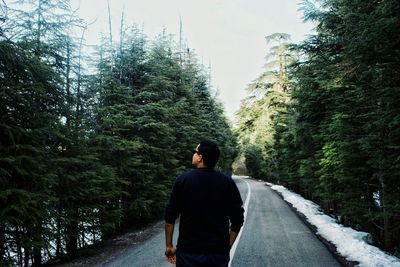 Full length rear view of man