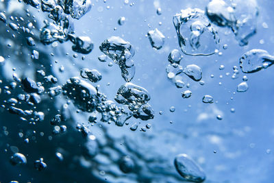 Close up of air bubbles under water