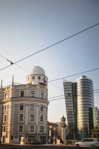 Low angle view of buildings against clear sky