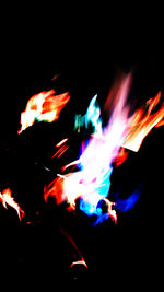 Close-up of fire in dark room