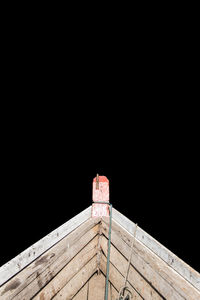 Low angle view of old building against sky at night