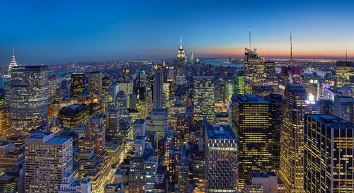 High angle view of illuminated buildings in city