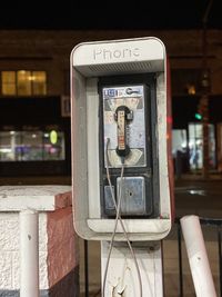 Close-up of old telephone booth