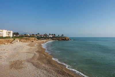 Scenic view of sea against clear sky