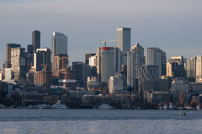 Modern buildings in city against sky