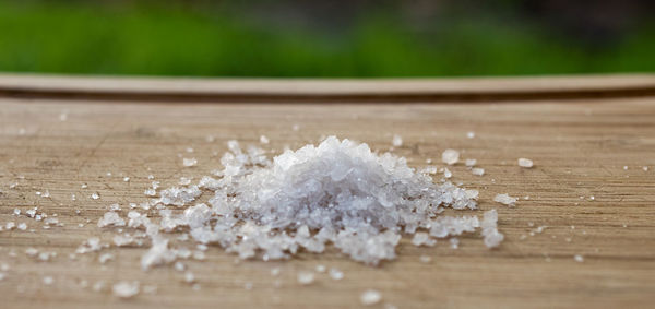 Close-up of ice cream on wooden table