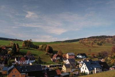 Scenic view of townscape against sky