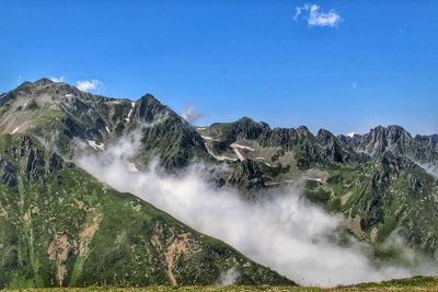 Scenic view of mountains against sky