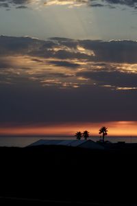 Scenic view of silhouette landscape against sky during sunset