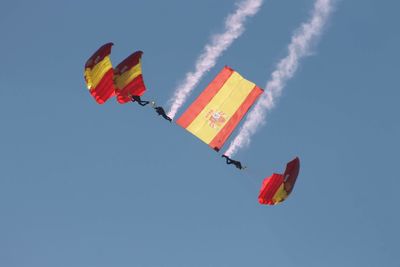 Low angle view of kite flying against clear sky