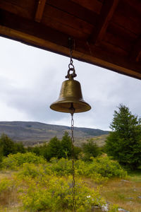 Low angle view of bell tower against sky