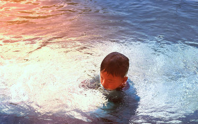 High angle view of woman in sea