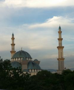 View of building against cloudy sky