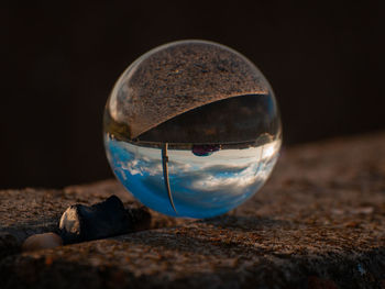 Close-up of crystal ball on table