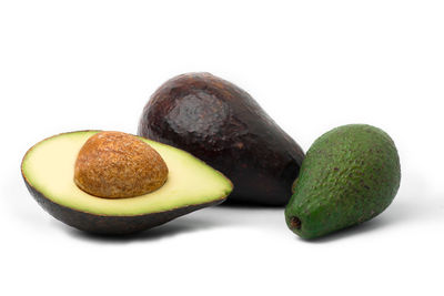 Close-up of fruits against white background