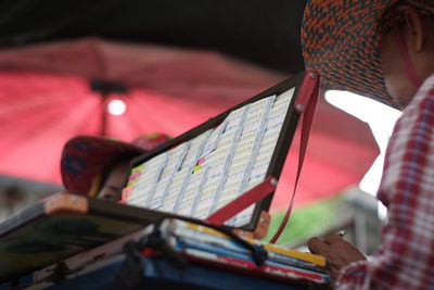 Close-up of man using mobile phone