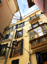 Low angle view of buildings against sky