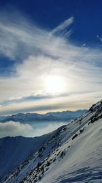 Scenic view of mountains against sky during winter