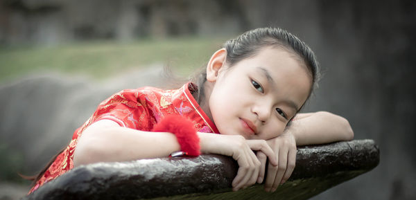 Portrait of girl looking at camera