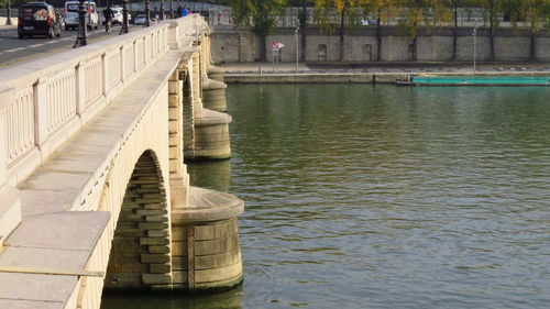 View of bridge over river in city