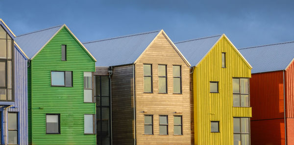 Buildings against blue sky