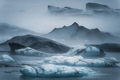 Ice bergs floating in water