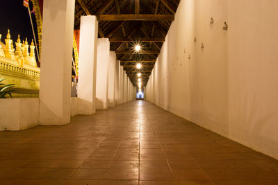 Illuminated corridor of building