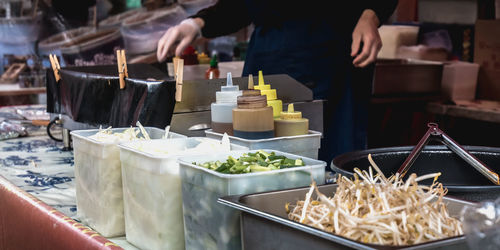 Man preparing food on table