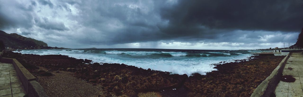 sky, water, sea, cloud - sky, cloudy, horizon over water, scenics, beach, beauty in nature, weather, tranquility, tranquil scene, shore, nature, cloud, overcast, storm cloud, idyllic, outdoors, rock - object