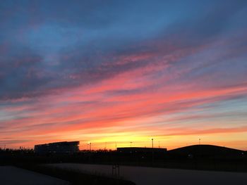 Dramatic sky over road during sunset