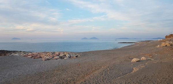 Scenic view of beach against sky