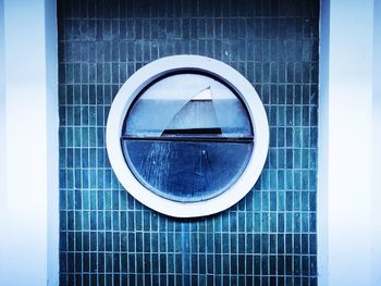 Reflection of building on glass window