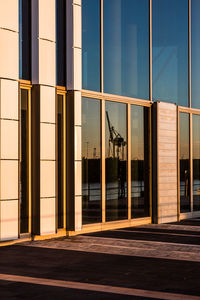 Building against sky seen through glass window