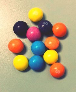 High angle view of multi colored balls on table