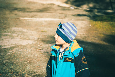 Close-up of boy standing on floor