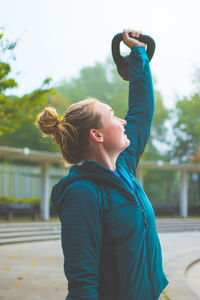 Young woman exercising outdoors