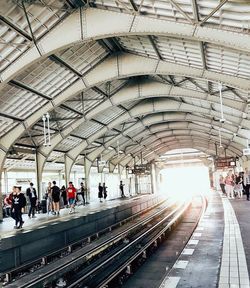 People at railroad station