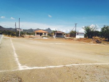 View of road against blue sky