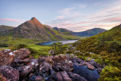 Scenic view of rocks in mountains against sky