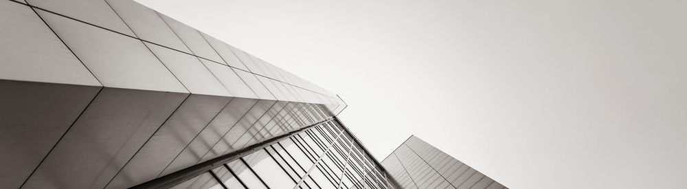 Low angle view of modern building against clear sky