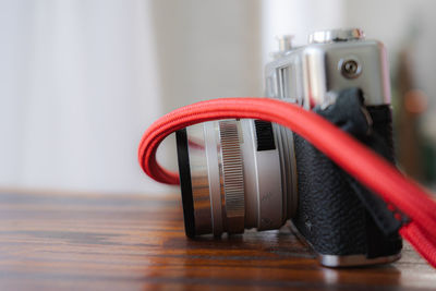 Close-up of camera on table