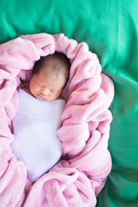 High angle view of a baby sleeping