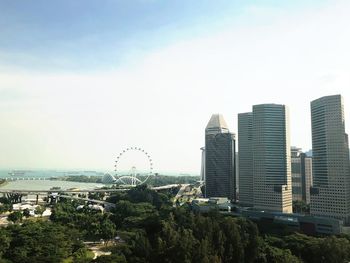 Buildings in city against sky