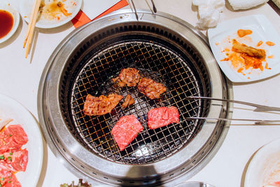 Meat on barbecue grill