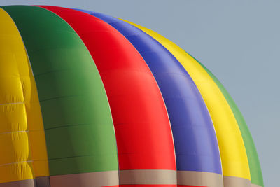 Low angle view of hot air balloon against clear sky